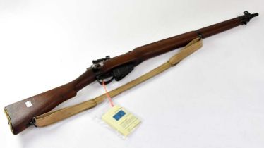 ENFIELD; a deactivated .303" No.4 Mk I Longbranch fully stocked bolt action rifle, the magazine