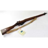 ENFIELD; a deactivated .303" No.4 Mk I Longbranch fully stocked bolt action rifle, the magazine