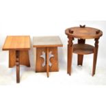 An oak rectangular top side table with stylised base, 58 x 64 x 40cm, together with two Arts and