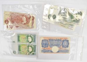 Mixed British banknotes comprising three series C £1 notes, consecutive numbers ending ...80, 81,