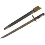 REMMINGTON; a WWI 1913 pattern bayonet, dated 16/2/1913, with relevant markings and leather