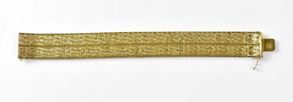 An 18ct yellow gold bracelet, length 19.6cm, approx. 76g. Condition Report: - Marked 'CT18 750' to
