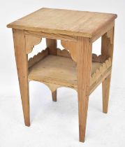 An early 20th century pine square top side/occasional table with undershelf to tapered side