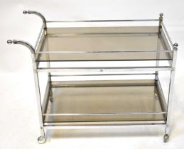 A smoked glass and chrome two-tier drinks trolley, 87 x 66 x 47cm.