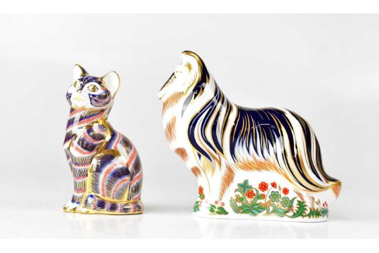 ROYAL CROWN DERBY; two Imari paperweights, 'Rough Collie', with gold stopper, and a seated cat (