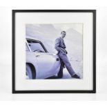 JAMES BOND INTEREST; black and white photograph, Sean Connery with Aston Martin DB5, during the