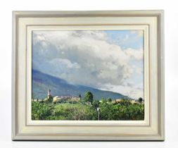 † ARMANDO ROMANO (Italian, born 1935); oil on canvas, 'Mountains in the Clouds, Tuscany', signed,