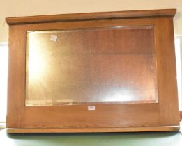 A vintage pine overmantel mirror, width 93cm.