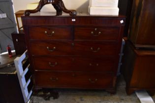 A Victorian mahogany chest of two short over three long drawers, with swan neck handles, on