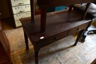 A 19th century writing table with two dummy drawers, on turned column legs, width 105cm, depth 50cm,