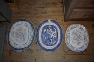 A collection of 19th century and later blue and white ironstone, predominantly meat plates,