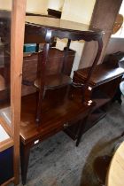 An Edwardian mahogany occasional table, together with a Georgian mahogany fold-over tea table with