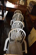 Four blue painted wheel back kitchen chairs (2+2).