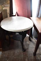 A Victorian cast iron Britannia pub table with later painted top, height 74cm.