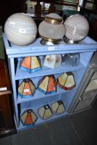 A collection of twelve Art Deco and later light shades including leaded glass examples.