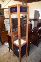 A modern pine display cabinet for Henry Julien, Lunetier France, with Perspex panels, height 182cm.