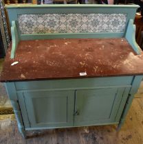 A painted pine wash stand, the raised back set with five ceramic tiles, above a marble top, single