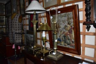 A decorative modern brass Corinthian column table lamp together with two further lamps including