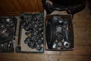 A large collection of 19th century and later pewter including various mugs, large plate etc.