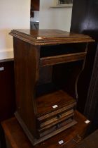 A painted pine pot cupboard on plinth base, together with an oak effect bedside table (2).