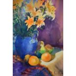 † JUNE BEVAN; watercolour, 'Yellow Lilies, Blue Vase', signed lower right, 51 x 37cm, framed and