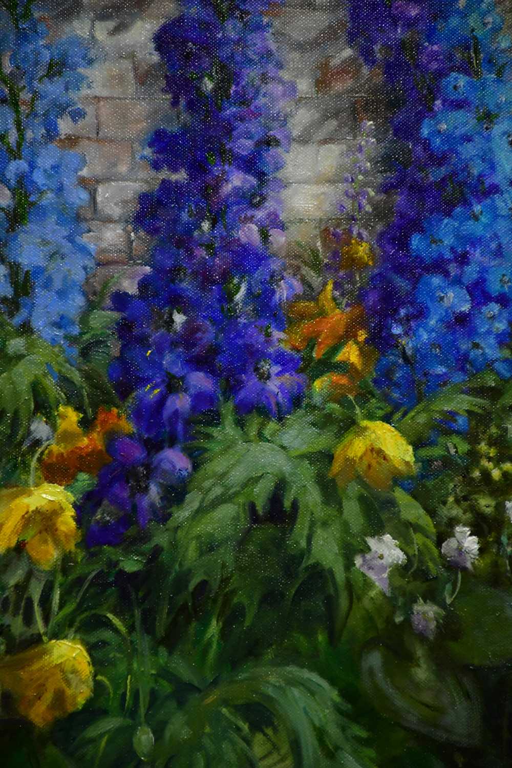 † JUNE BEVAN; oil on canvas, 'Delphiniums in my Garden', signed lower right, 49 x 38cm, framed. - Image 2 of 2