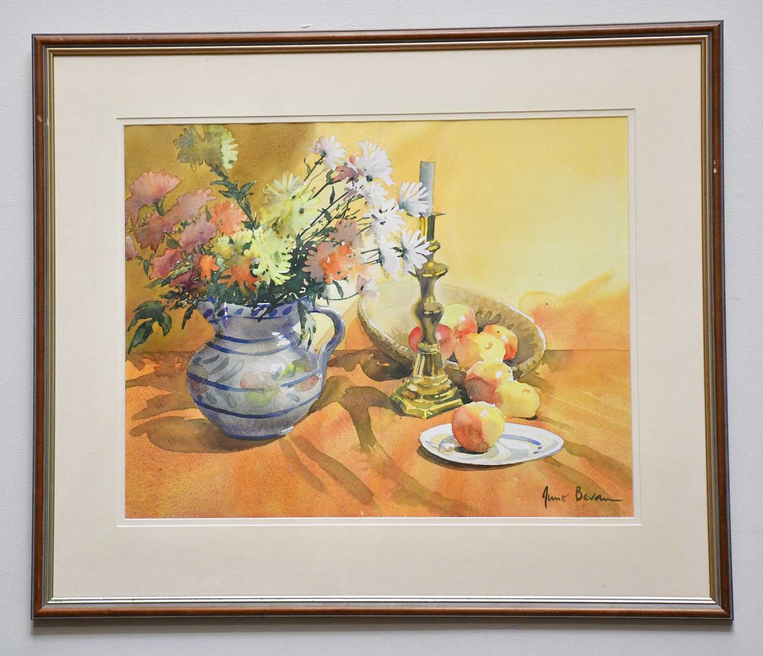 † JUNE BEVAN; watercolour, 'Chrysanthemums, Fruit and Candlestick', signed lower right, 39 x 50cm,