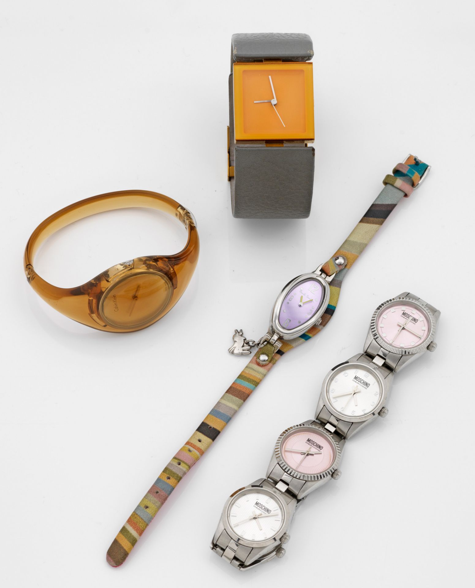 Vier Armbanduhren von Paul Smith, Philippe Starck,
