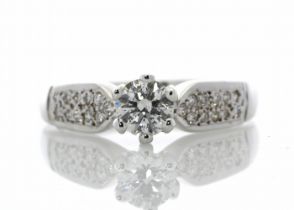 18ct White Gold Single Stone Claw Set With Stone Set Shoulders Diamond Ring (0.54) 0.76 Carats - One