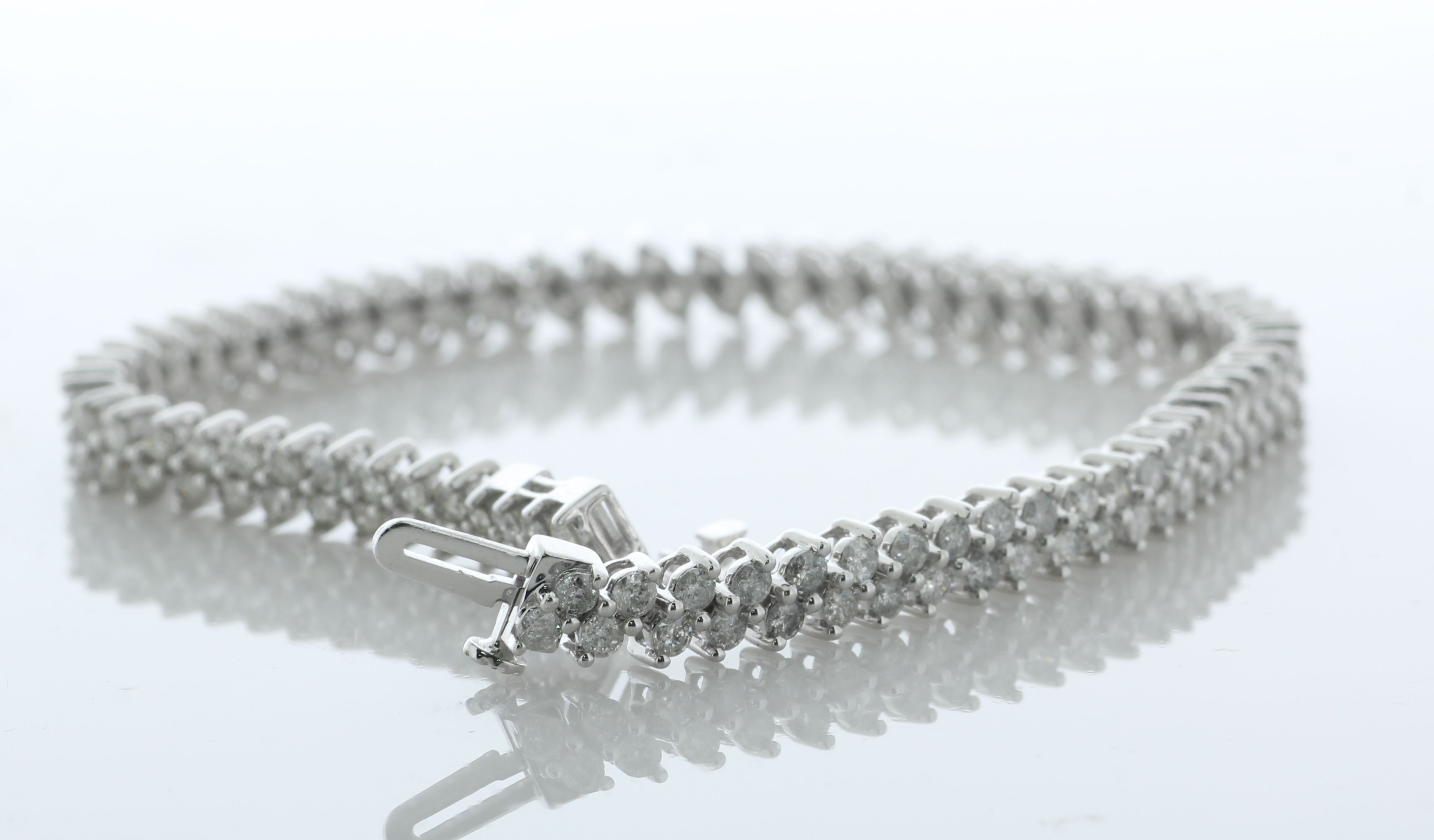10ct White Gold Diamond Tennis Bracelet 5.00 Carats - Valued By AGI £11,360.00 - Sixty six links - Image 4 of 6