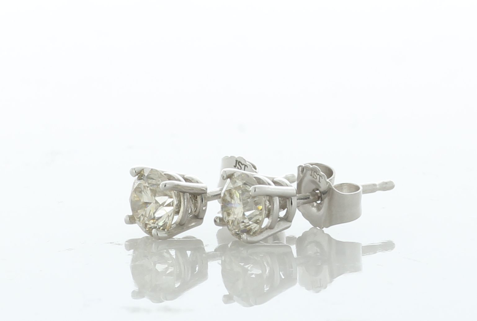 14ct Gold Gallery Set Diamond Earring 0.90 Carats - Valued By AGI £3,850.00 - Two round brilliant - Image 2 of 3