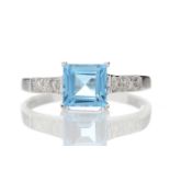 9ct White Gold Diamond And Blue Topaz Ring (BT1.28) 0.04 Carats - Valued By IDI £950.00 - One square