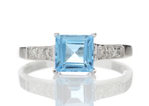 9ct White Gold Diamond And Blue Topaz Ring (BT1.28) 0.04 Carats - Valued By IDI £950.00 - One square