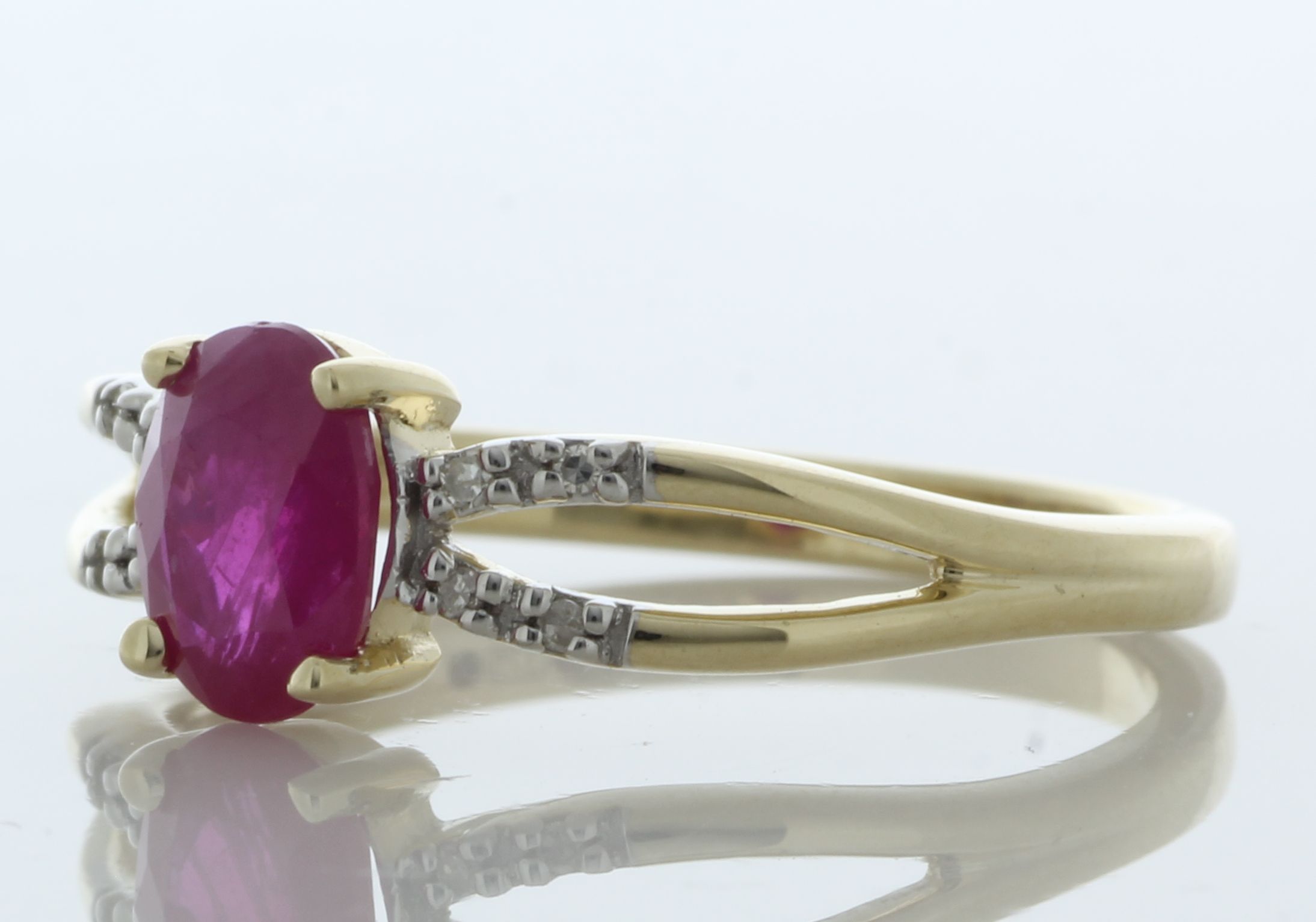 9ct Yellow Gold Diamond And Ruby Ring (R0.81) 0.03 Carats - Valued By IDI £2,505.00 - An oval 8mm - Image 2 of 4