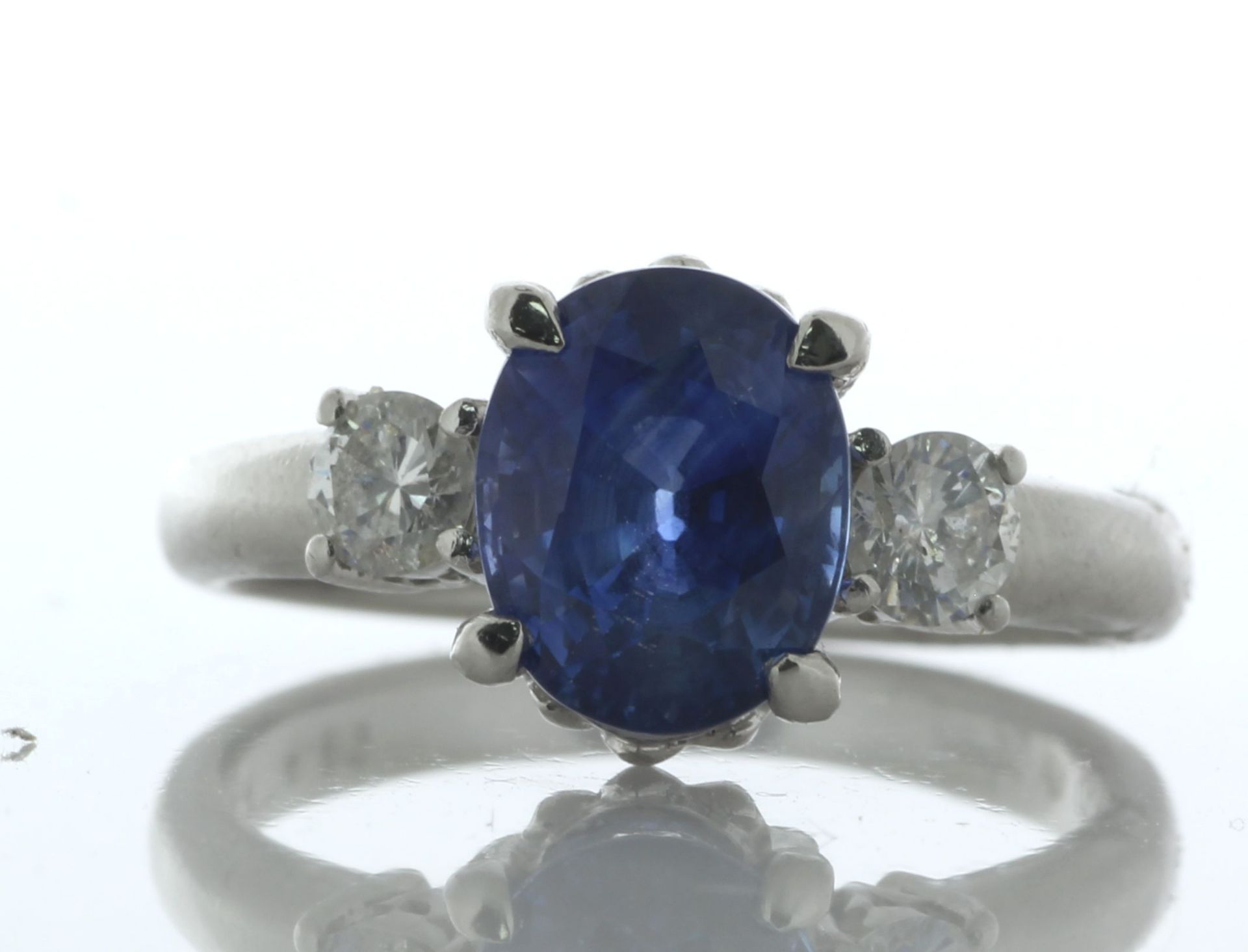 Platinum Oval Sapphire And Diamond Ring (S3.16) 0.37 Carats