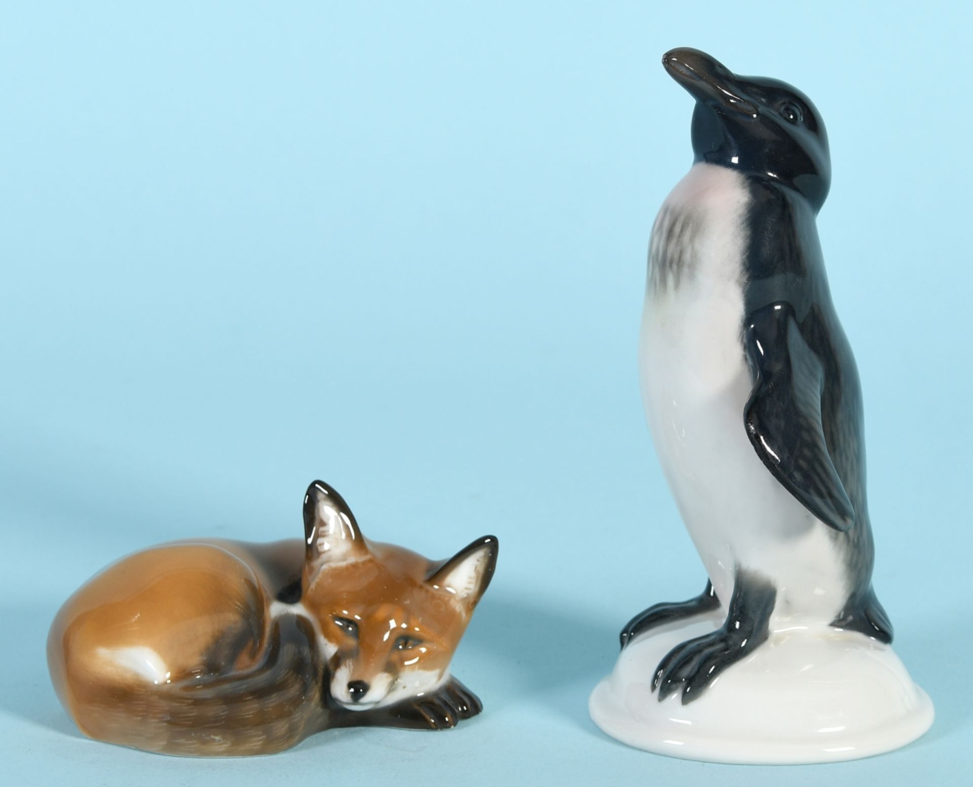 Figuren, 2 Stück - Liegender Fuchs und Pinguin "Rosenthal"