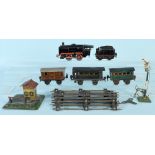 Märklin - Dampflok mit Tender, 3 Wagen und 6 Gleisteilen