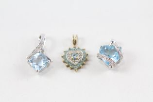 3x 9ct gold blue topaz & diamond pendants (3.9g)