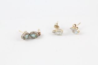 2 x 9ct gold diamond & topaz stud earrings (1.7g)