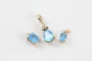 3x 9ct gold blue topaz pendants (2.6g)