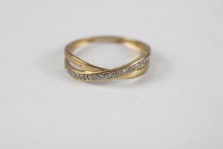 9ct gold diamond cross-over ring (1g) Size K