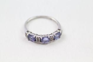 9ct gold blue tanzanite & white gemstone eternity ring (1.7g) Size O