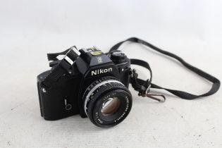 Nikon EM SLR FILM CAMERA All Black, w/ Nikon Series E 50mm F/1.8 Lens WORKING // Nikon EM SLR Film