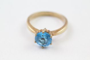 9ct gold blue gemstone solitaire ring (5.1g) Size W