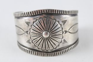 A silver Native American design bangle (73g)