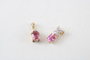 2 x 9ct gold diamond & ruby pendants (2g)