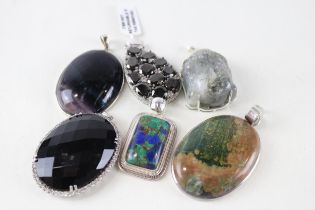 Six silver mounted gemstone pendants (112g)