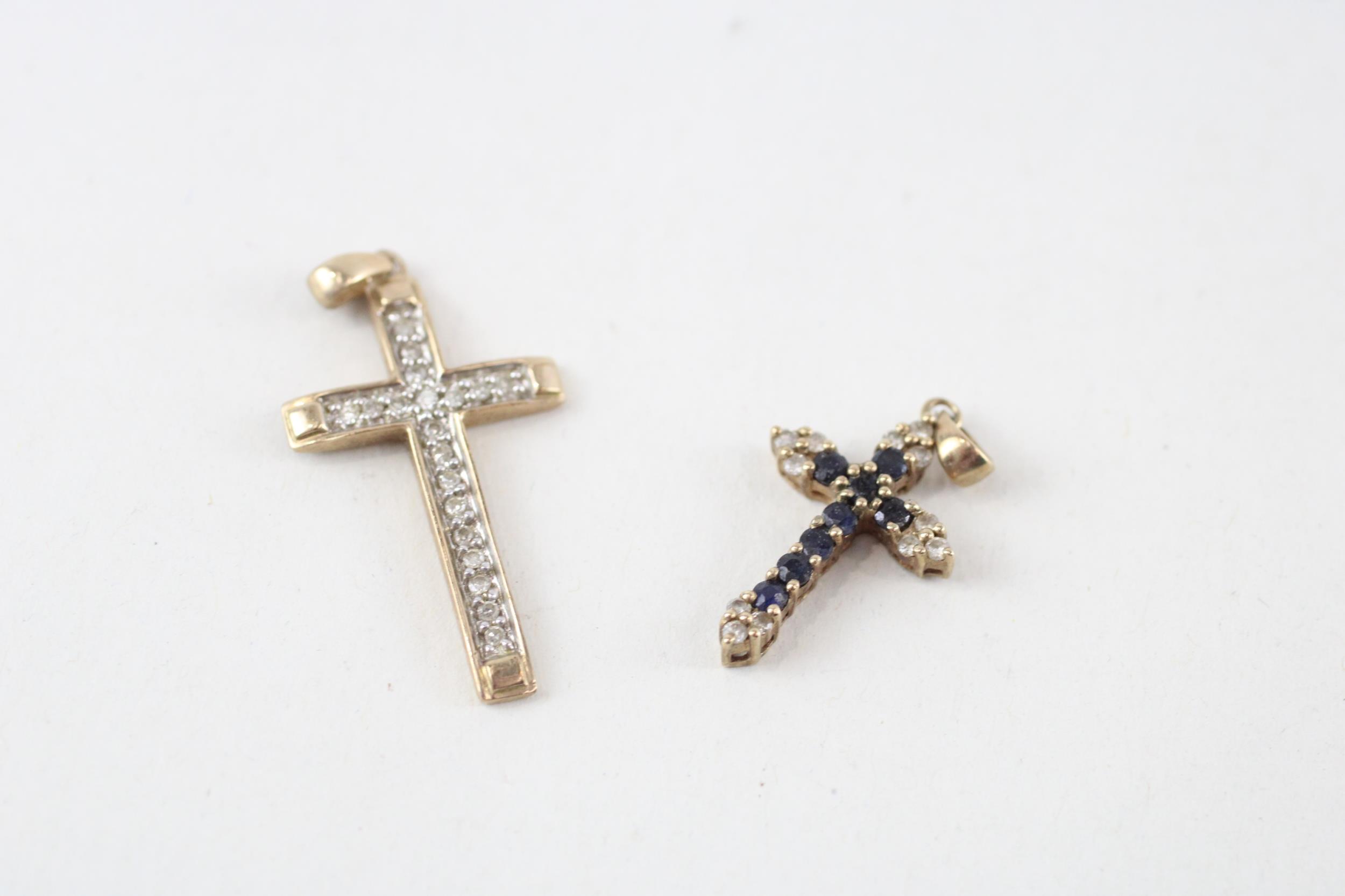 2 x 9ct gold diamond cross pendants (2.6g)