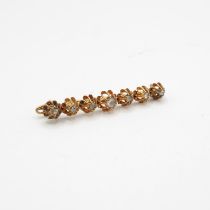 9ct gold and diamond bar brooch 45mm long old cut diamonds, central diamond measuring 3mm sq. with