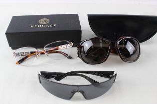 Collection of Designer Versace / Versus Glasses x 3 // Items are in previously owned condition Signs